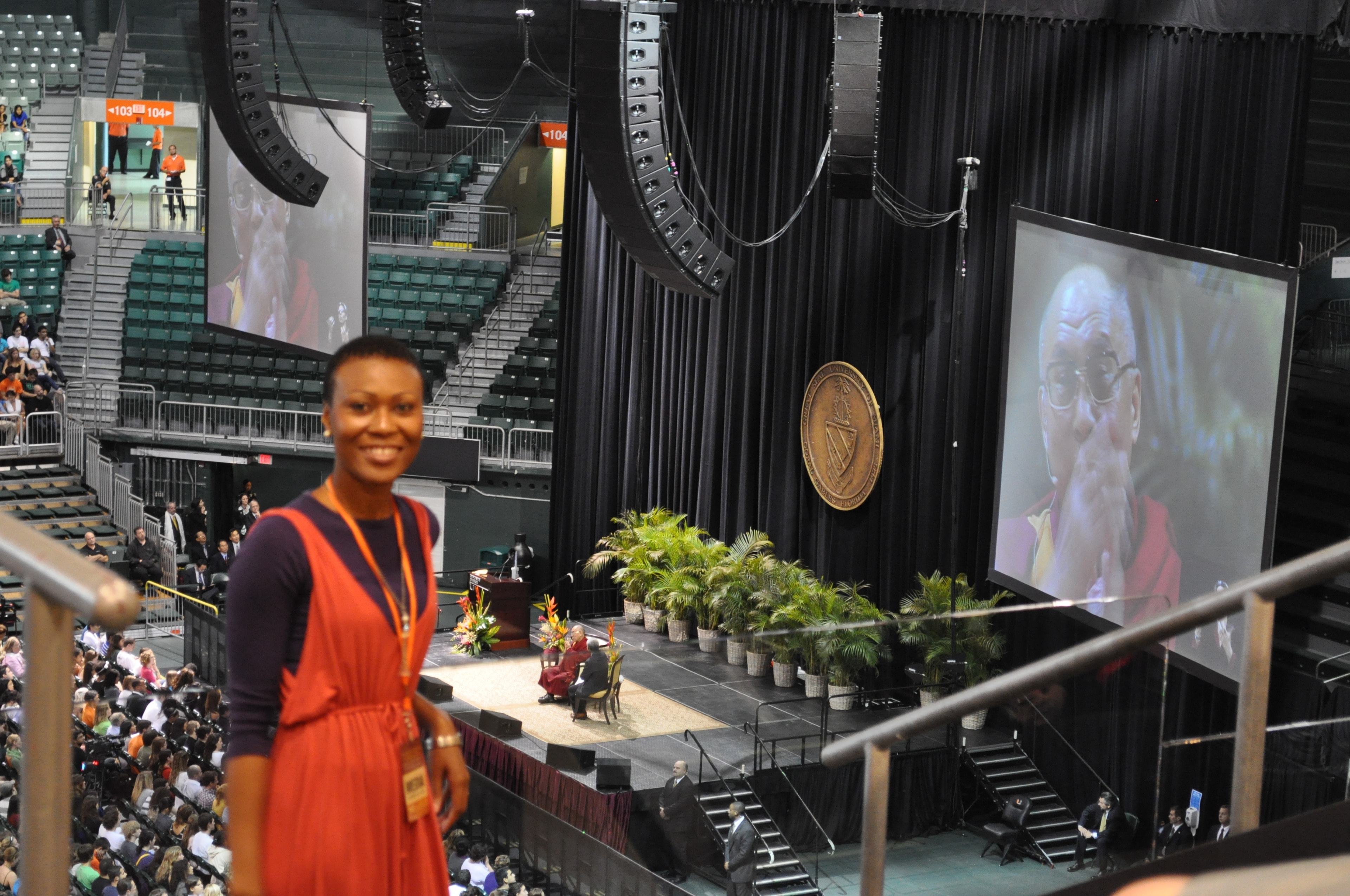Daedrian McNaughton at the BankUnited Center with the Dalai Lama on screen, University of Miami, 2010