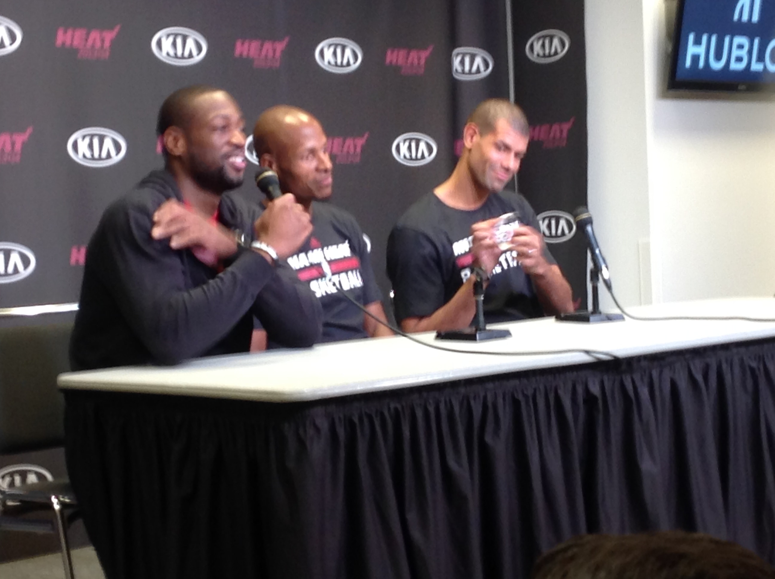 Dwyane Wade, Ray Allen, and Shane Battier at the Miami Heat championship press conference, 2013