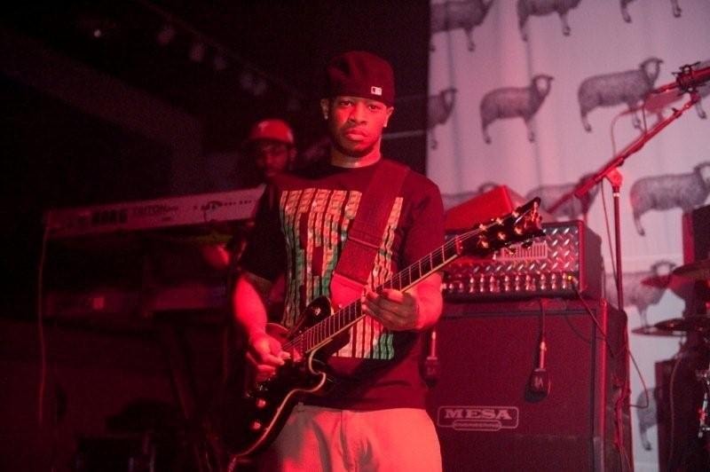 Pharrell Williams, close-up, mid-performance.