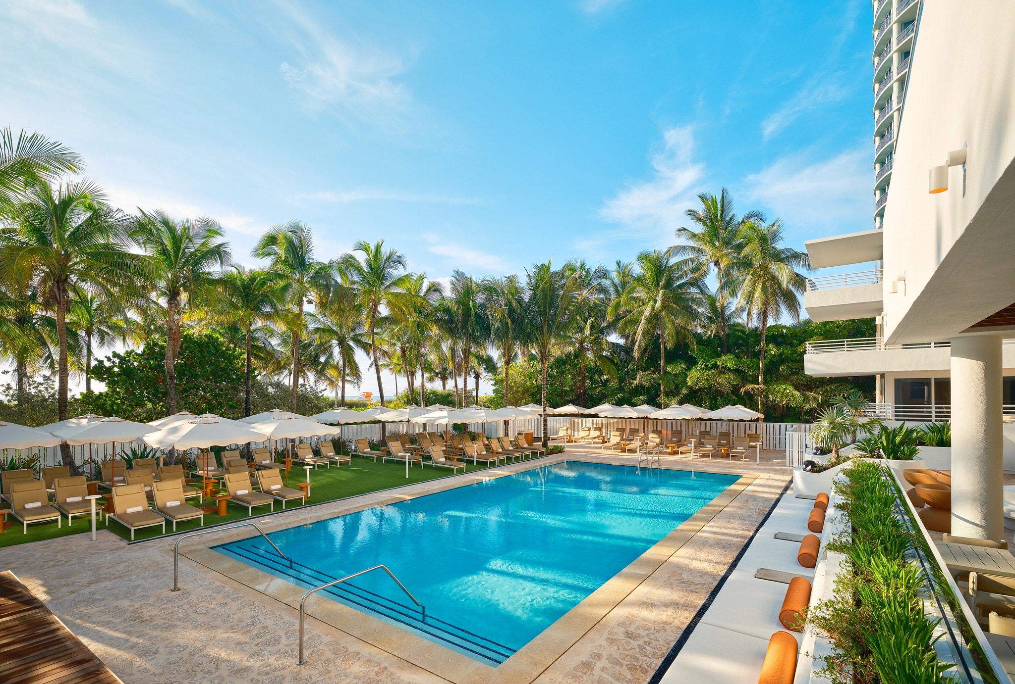 The resort pool at Royal Palm South Beach — private beach access and oceanfront views are included.